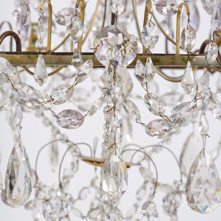 A Russian / Northern European Louis XVI-style gilt brass and blue glass six-branch chandelier, 19th century.