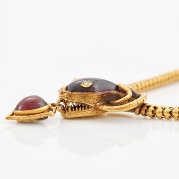 A 14K gold necklace set with garnets and rose-cut diamonds.