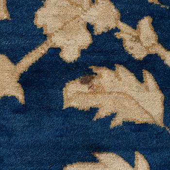 An antique Peking carpet, north China, c. 438 x 373 cm.