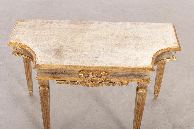 A mid 20th century Louis XVI-style table from Paoletti, Firenze Italy.