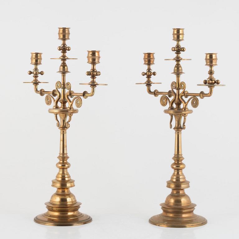 A pair of brass candelabra, Gusums Bruk, circa 1900.