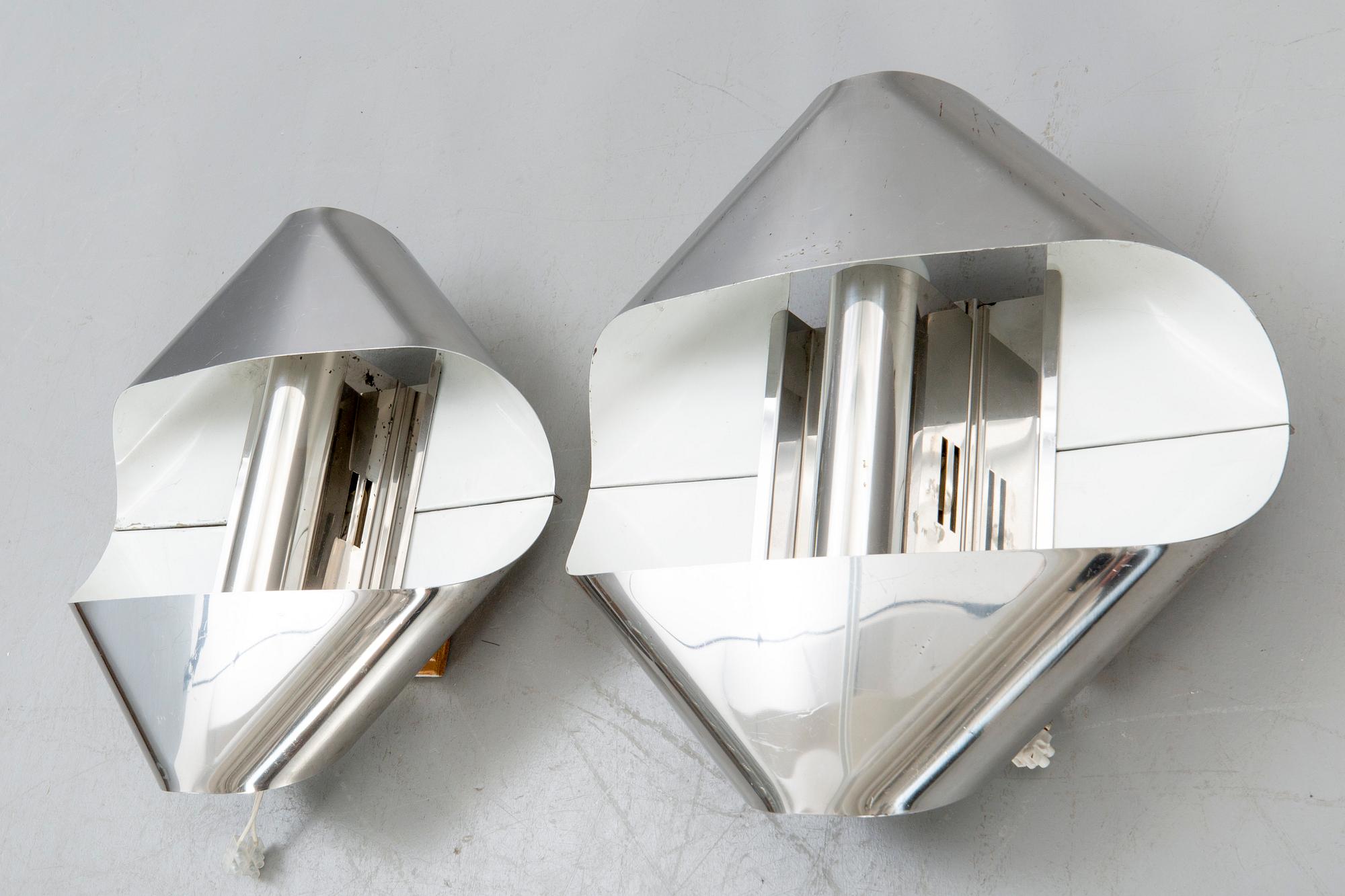 Wall lamps a pair of Guzzini Italy 1970s.