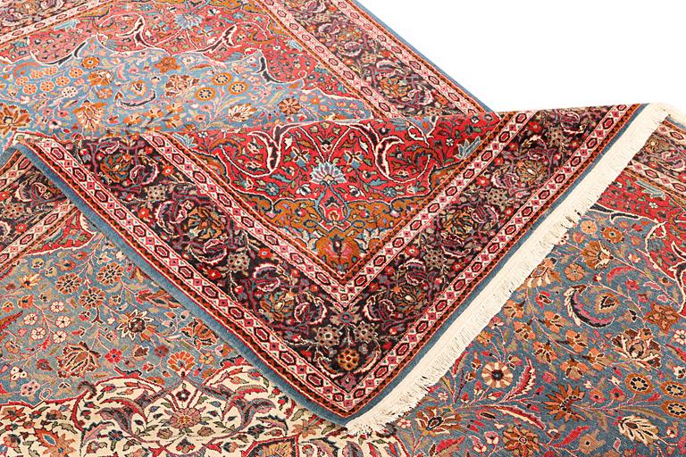 A semi-antique Keshan Carpet, a. 275 x 183 cm.