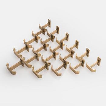 A set of 19 coat hooks, 1960s/70s.
