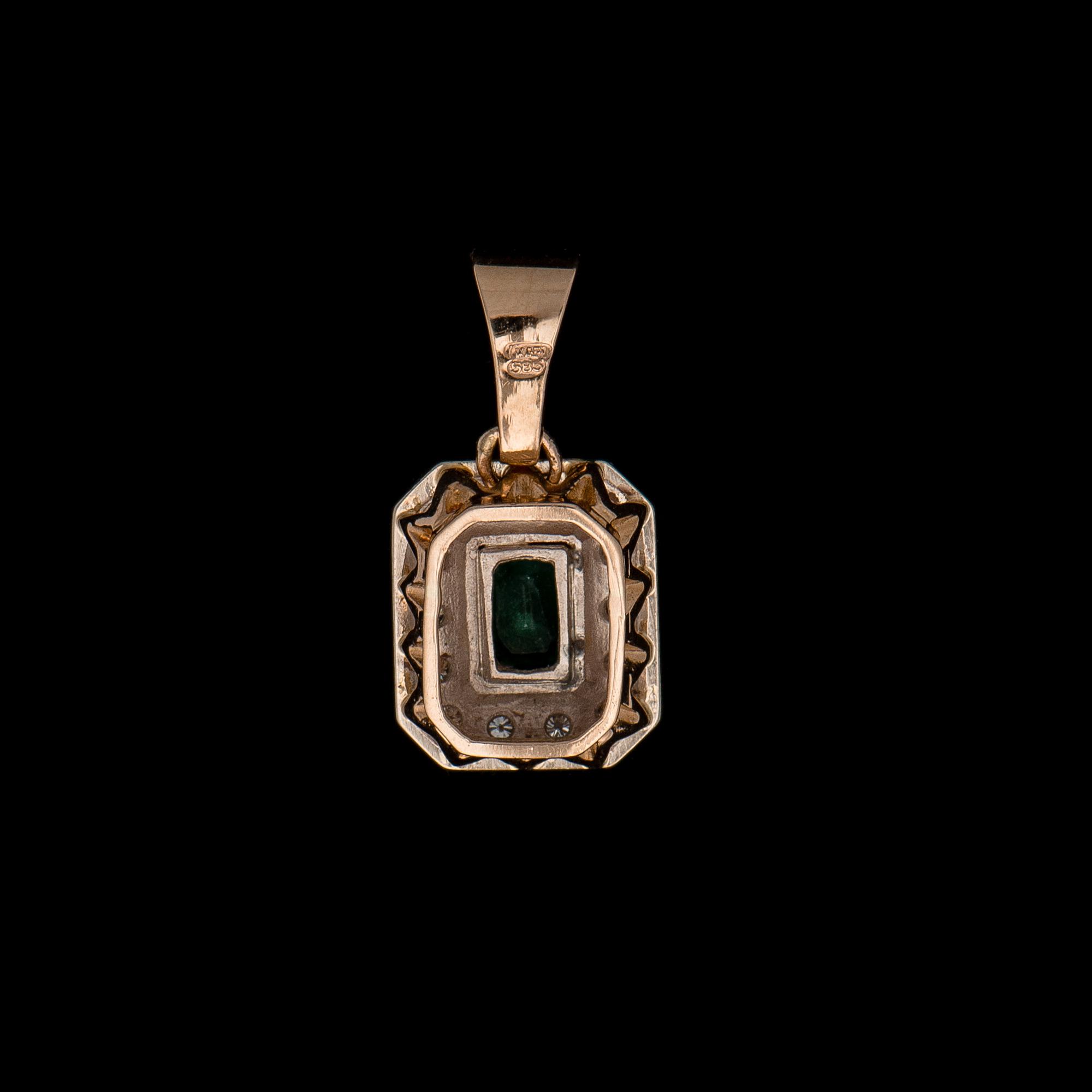 HÄNGE, fasettslipad smaragd, briljantslipade diamanter, 14K guld och vitguld.