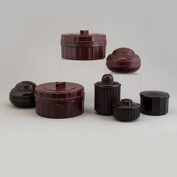 a set of 7 bakelit boxes from France, 1930's.