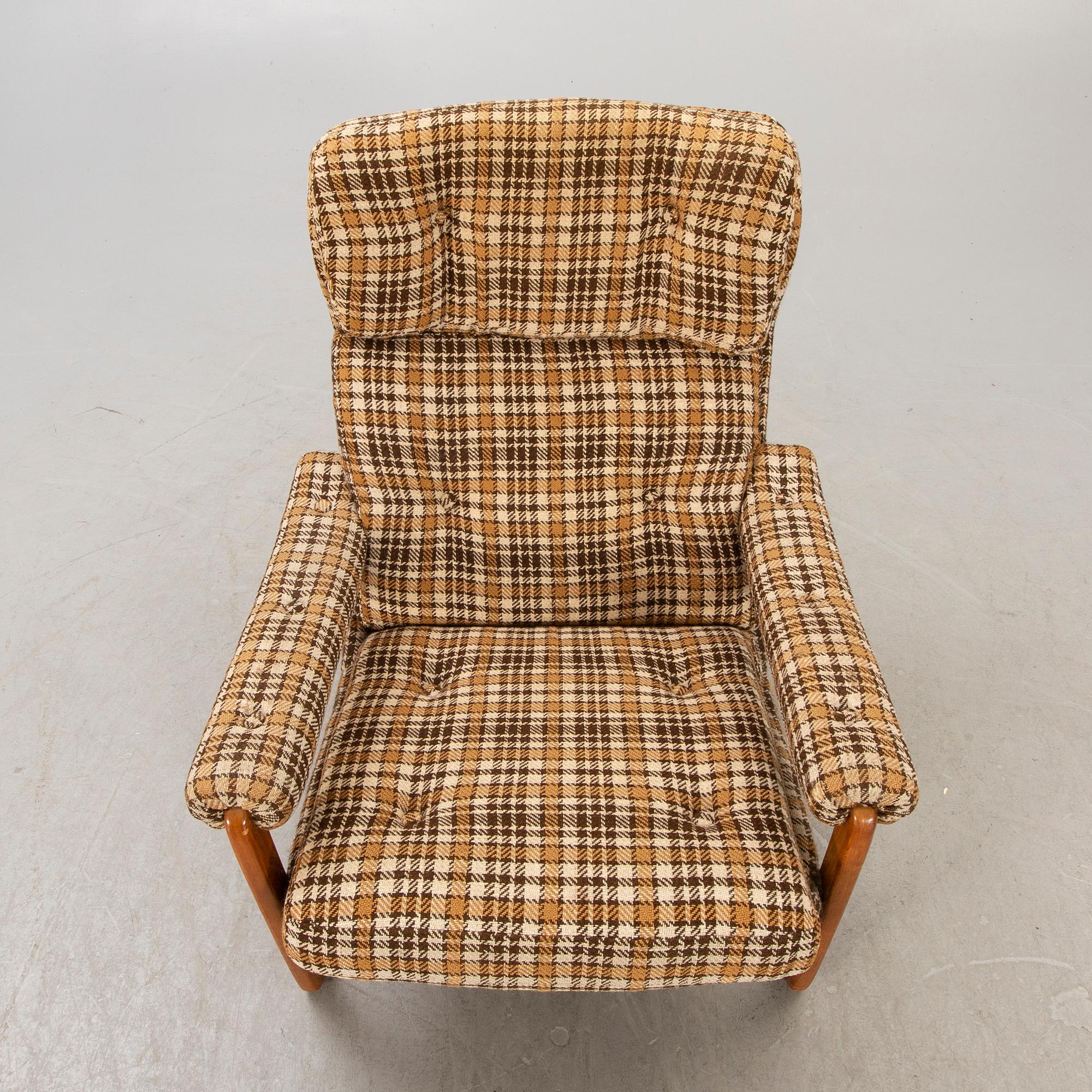 An Inge Andersson walnut "Draken" easy chair late 1960s.