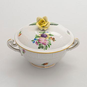 A pair of Herend porcelain candlesticks, and a lidded sugar bowl, Hungary.