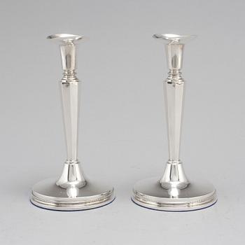 A pair of silver candle sticks by Eric Löfman, Uppsala 1961.