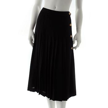 CÉLINE, a black pleated wool skirt.