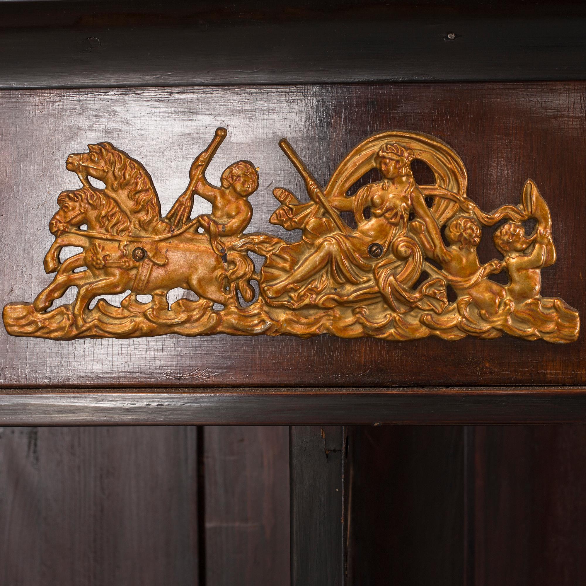 A mid 1800s Empire bookcase.