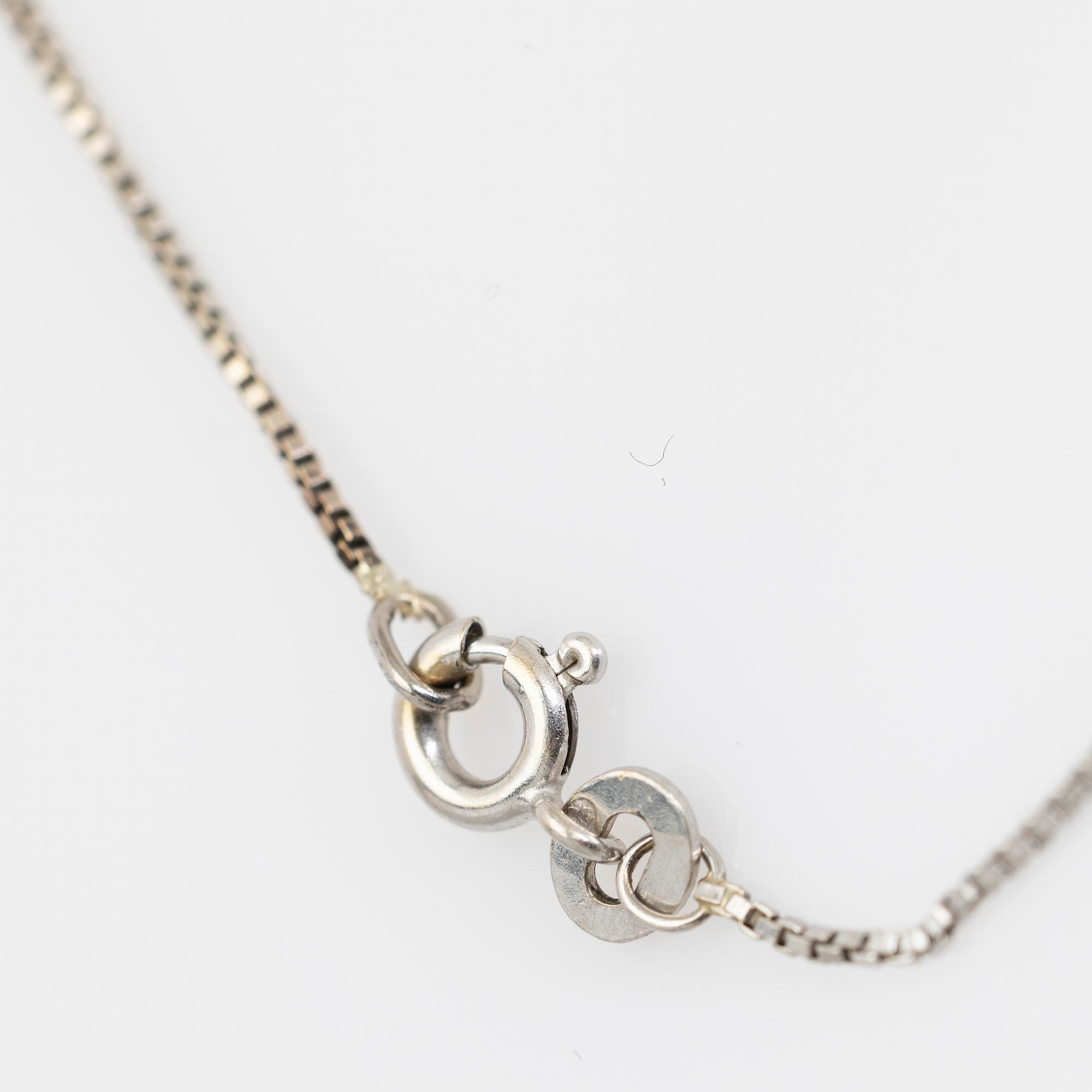 Collier, 18K vitguld med diamant.