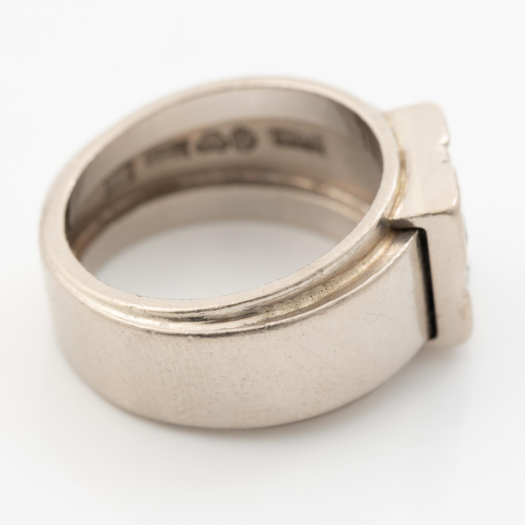 Ring, 18K white gold with a brilliant-cut diamond weighing 1.52 ct.