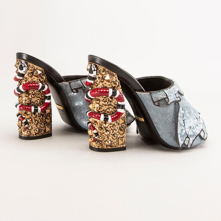 Gucci,.