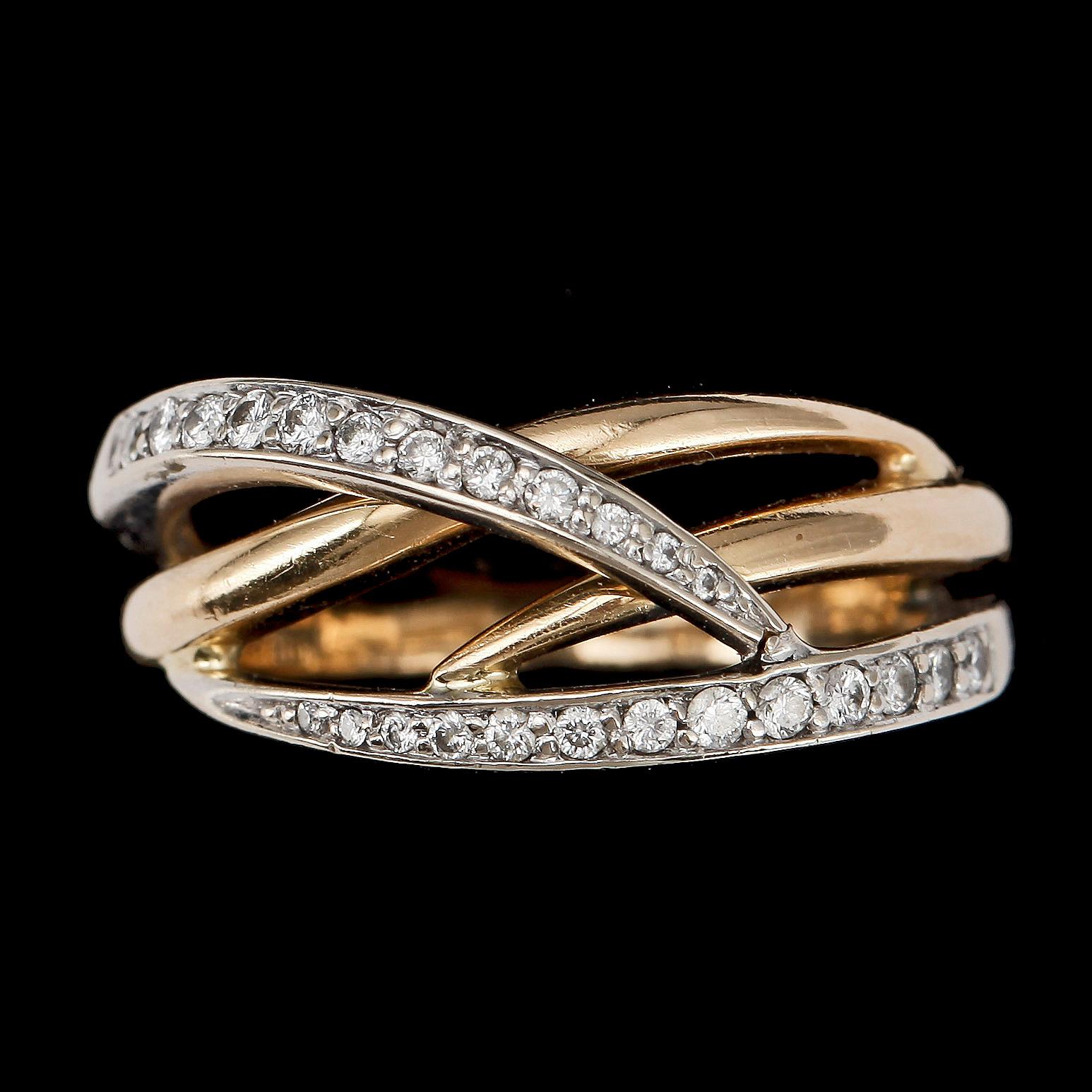 RING, 18k rött guld o vitguld med briljantslipade diamanter tot ca0,22ct. Engelbert, 1990/2000-tal. Vikt 6,1g.