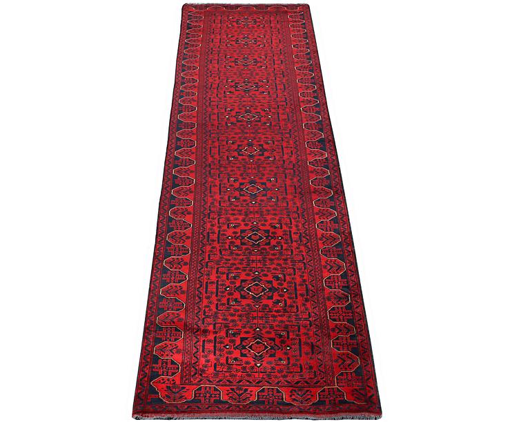 A runner carpet, Afghan, c. 472 x 88 cm.