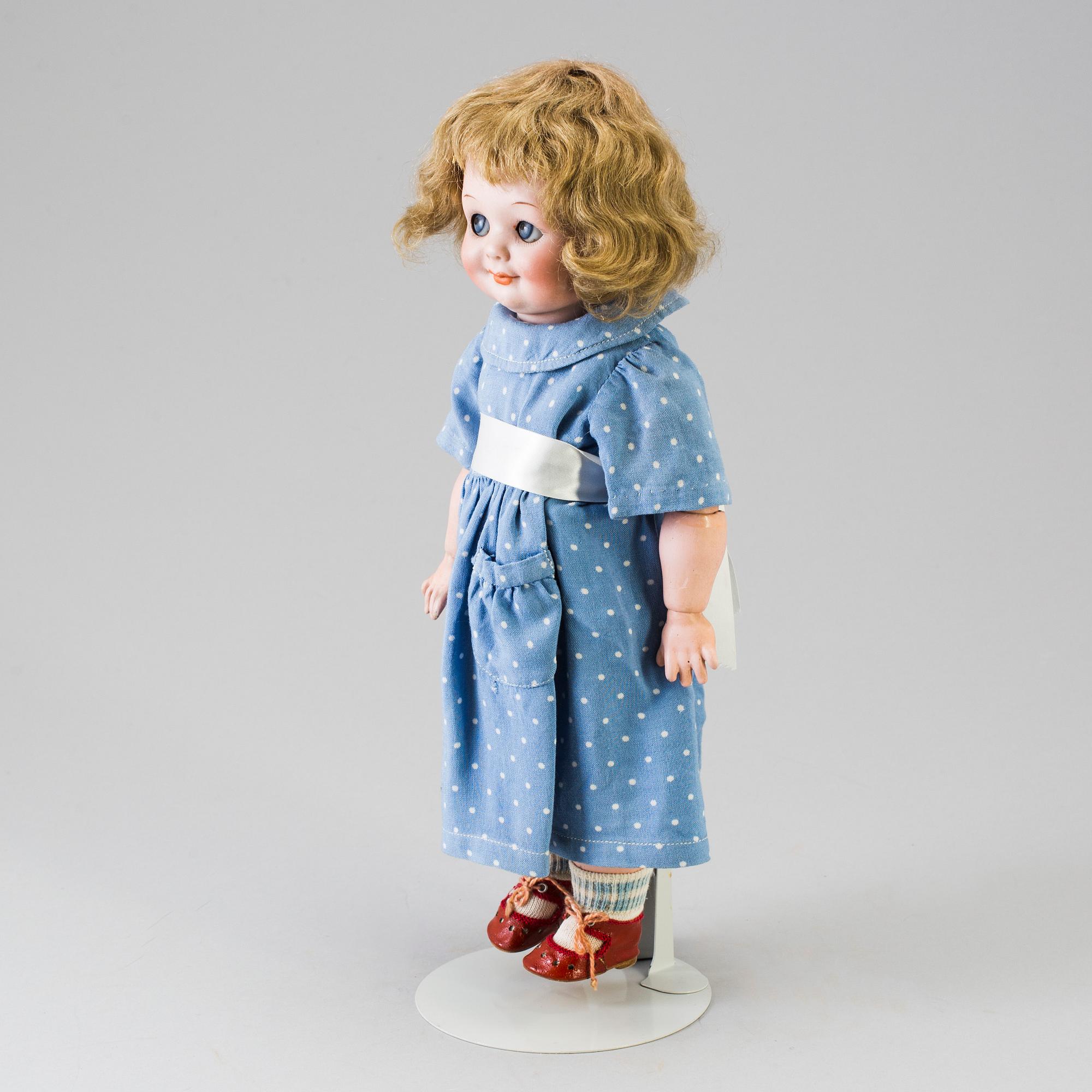 A bisque headed doll 323 by Armand Marseille, Germany, 1914-1925.