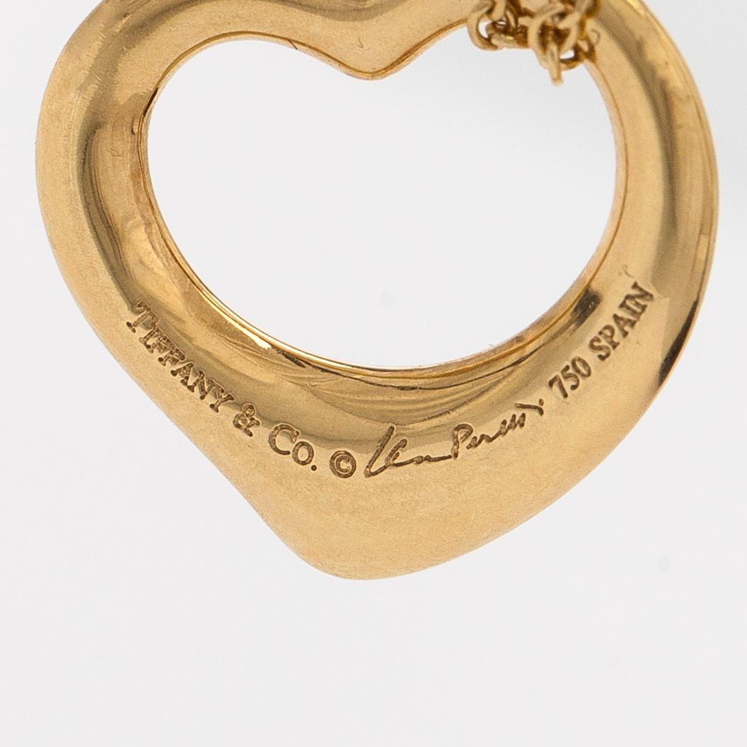 Tiffany & Co, Elsa Peretti, halsband, "Open Heart", 18K guld och gula diamanter.