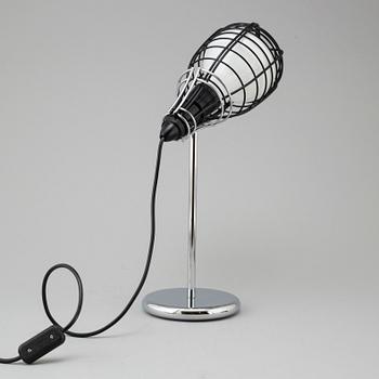 A 'Cage Mic' table light by Diesel for Foscarini.