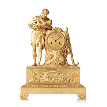103. A French Empire early 19th century mantel clock.