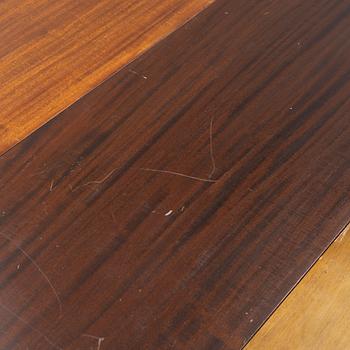 A Gustavian style mahogany dining table, 20th Century.