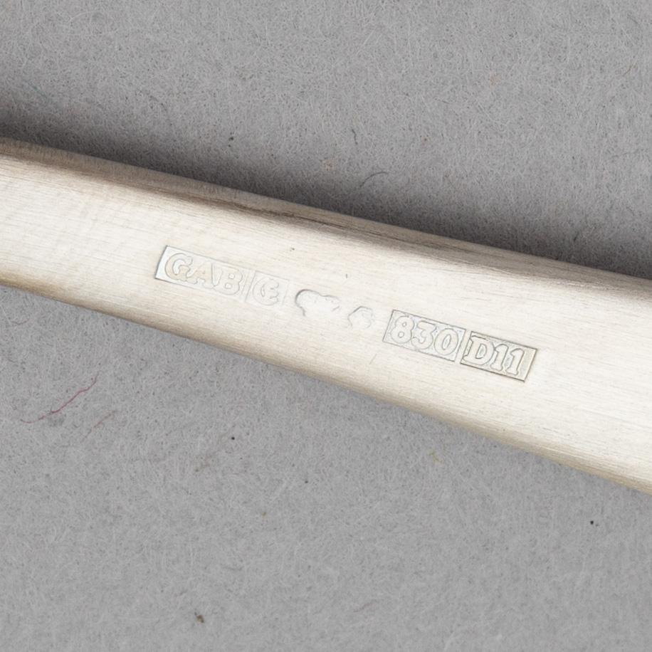 Jacob Ängman, twelve silver spoons and a silver spatula, 'Rosenholm', GAB, 2001-2002.