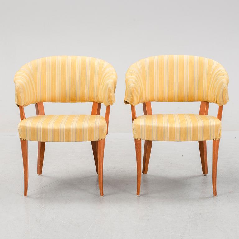 Carl Malmsten, a pair of 'Lata Greven' easy chairs, OH Sjögren, and a 'Berg' table, second half of the 20th Century.