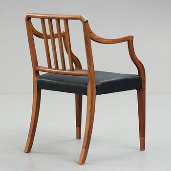 An English 20th century mahogany armchair.