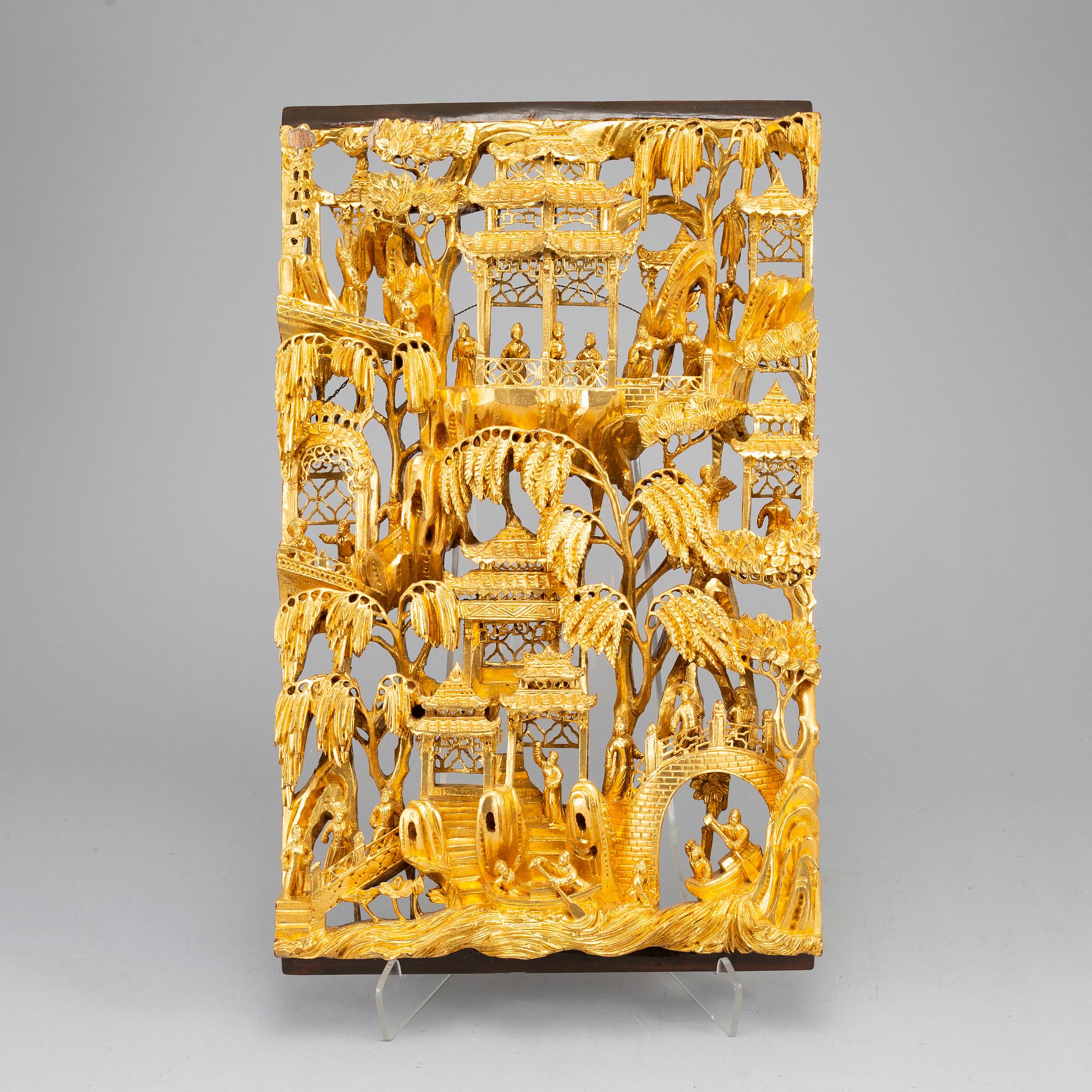 A Chinese wooden and lacquered wood panelm early 20th century.