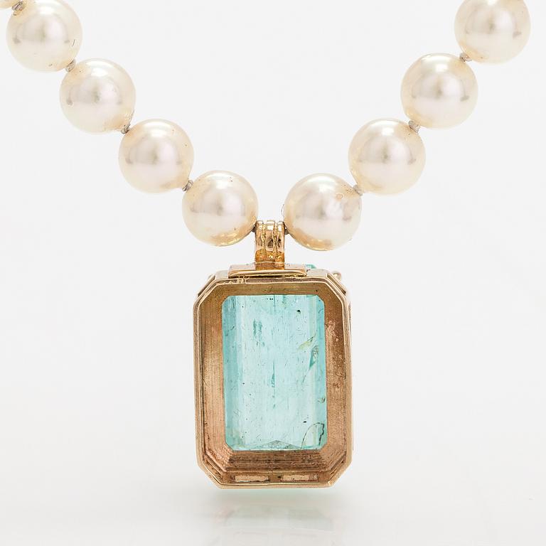 A pearl collier with and aquamarine, 14K and 18K gold and cultured pearls.