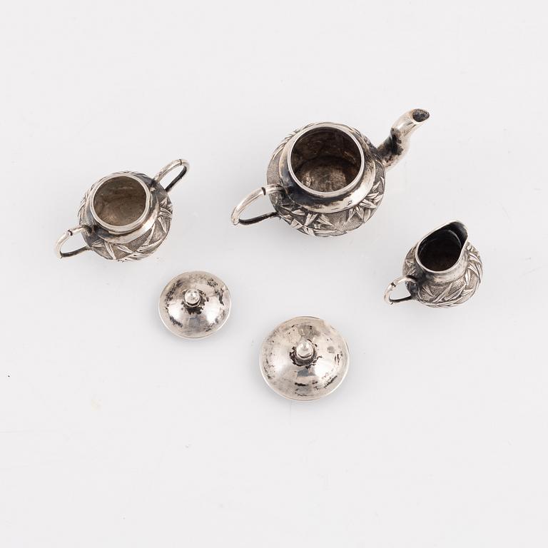 A Japanese Silver Minature Tea Service, probably early 20th Century, (3 pieces).