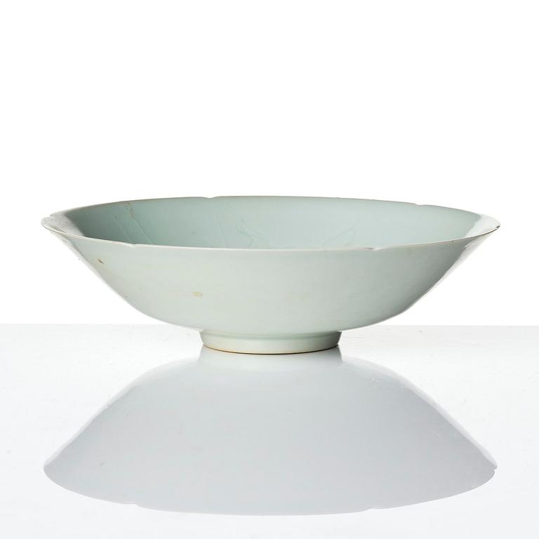 A carved qingbai foliate bowl, Song dynasty (960-1279).