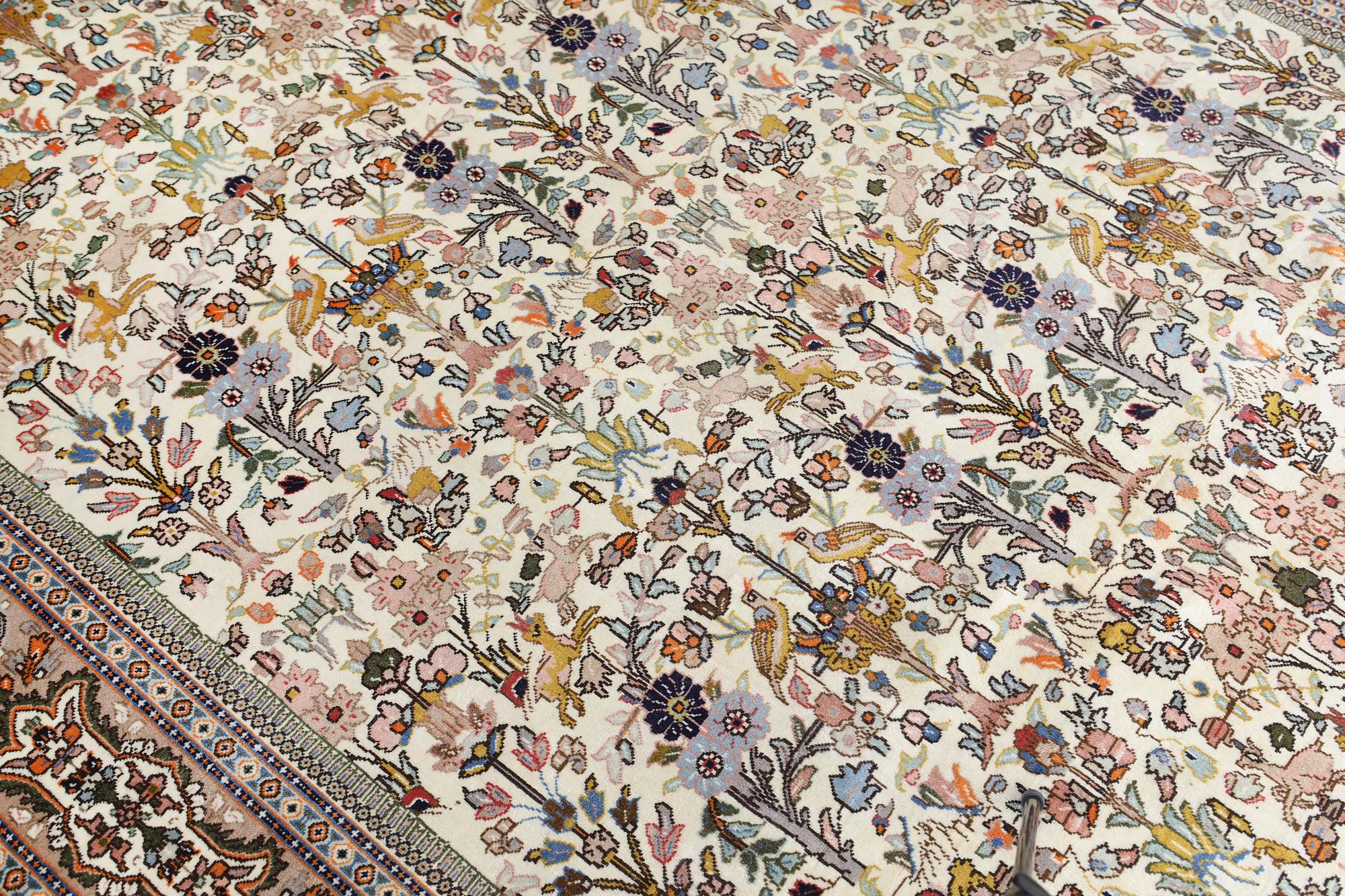 A Täbriz Tabatabai carpet, c.  352 x 240 cm.