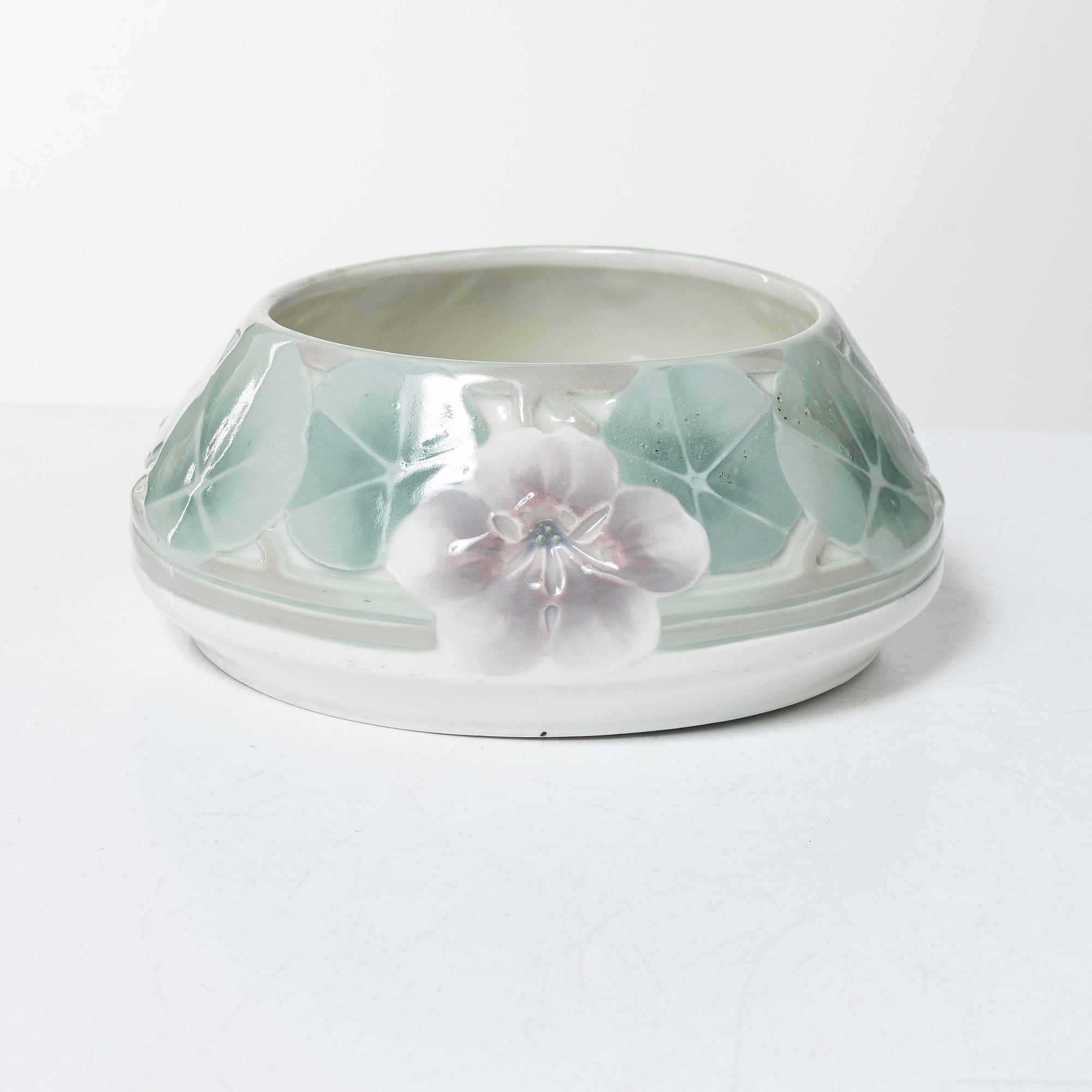 Hilma Persson-Hjelm, "Jössehärad", a porcelain figurine and an Art Nouveau bowl, Rörstrand, early 20th century.