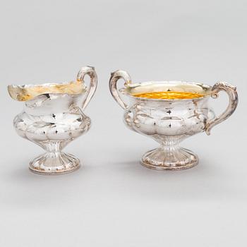 A silver coffee pot, a parcel-gilt sugar bowl and cream jug, Turku Finland 1946 and 1985.