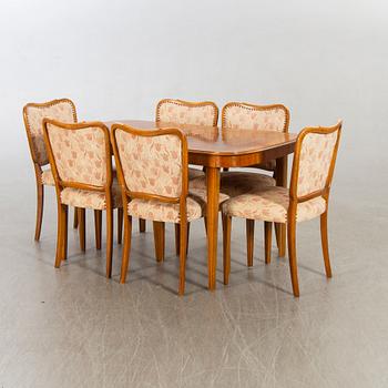 A 1950/60's dining table and chairs.