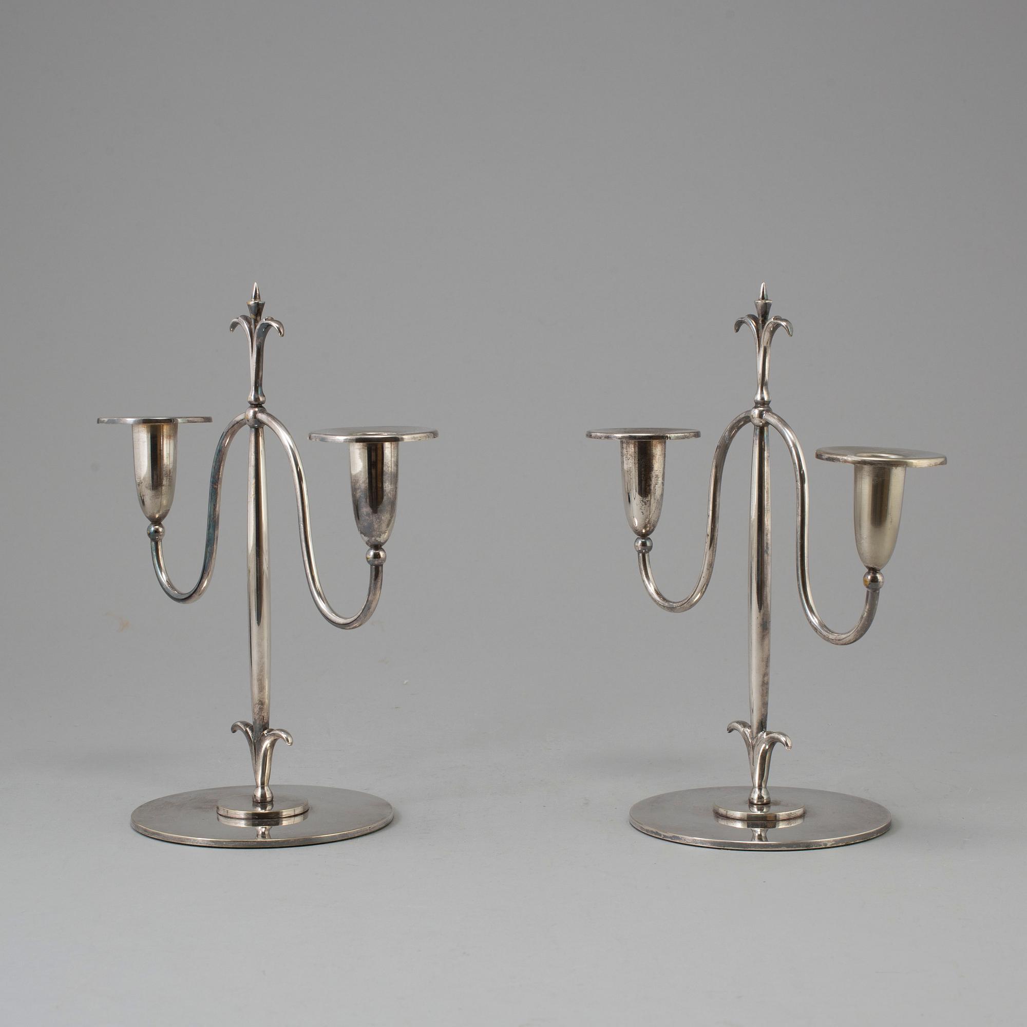 a pair of Elis Bergh silver plated candelabras, Swedish grace, CG Hallberg, Stockholm, 1920s.