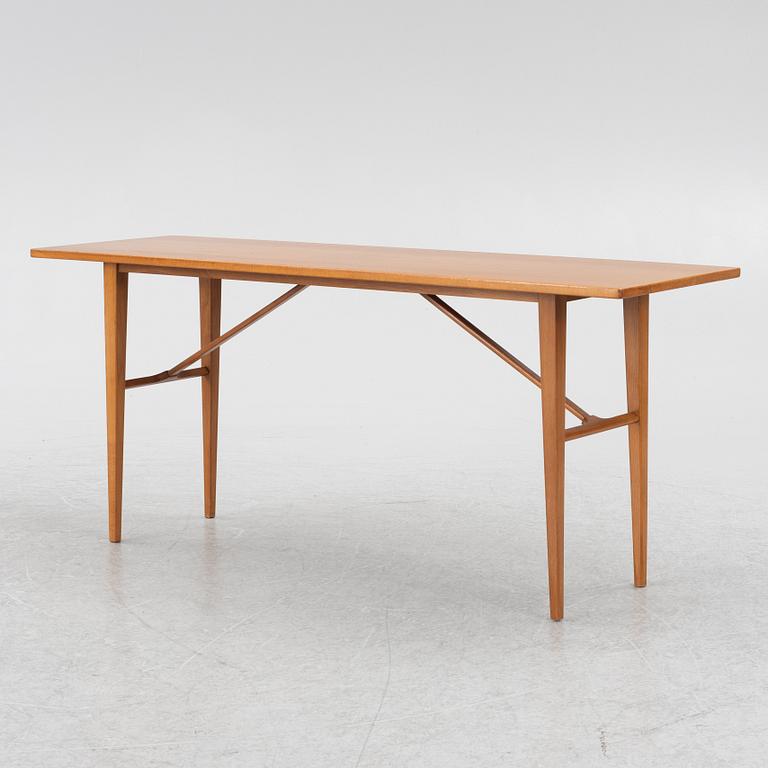 A coffee table/side table, Blomstermåla, circa the mid-20th century.