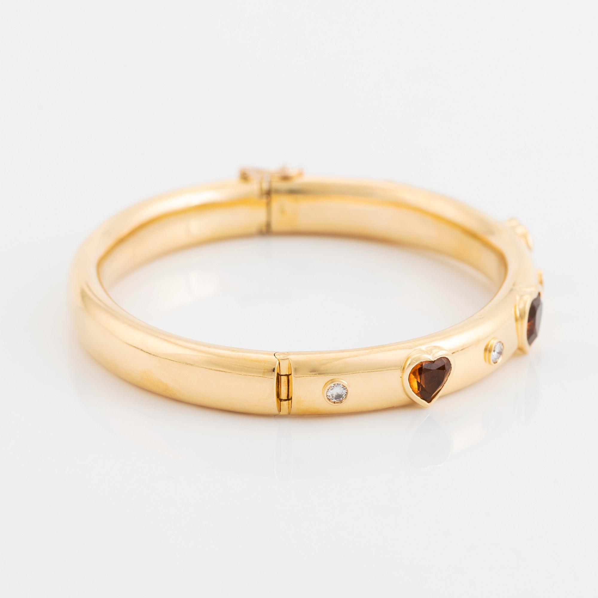 Armring 18K guld med hjärtformade citriner och runda briljantslipade diamanter, David Morris.