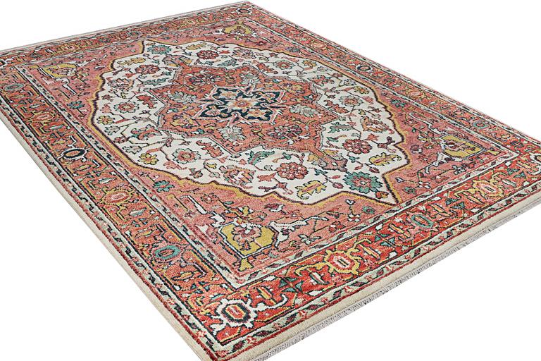 An oriental carpet with Mamluk design, c. 367 x 280 cm.