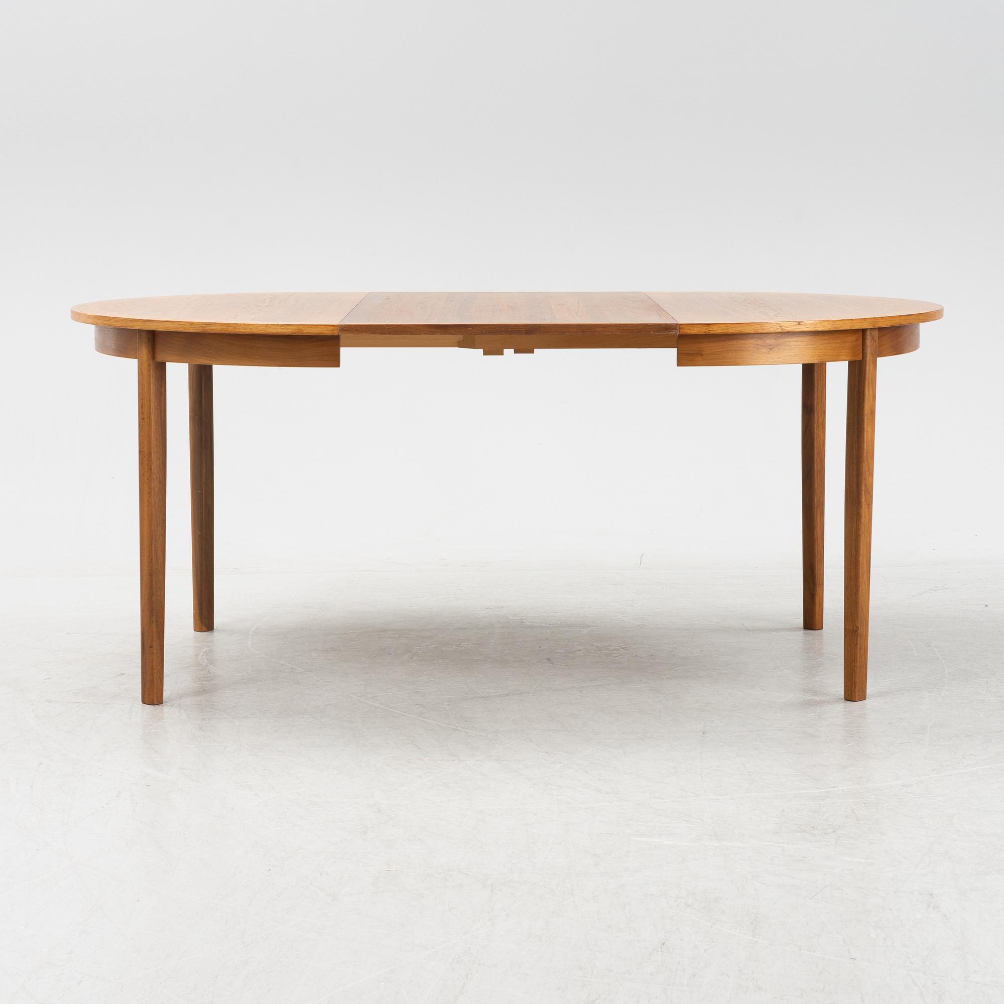 Nils Jonsson, a walnut-veneered dining table from Troeds, 1960's.