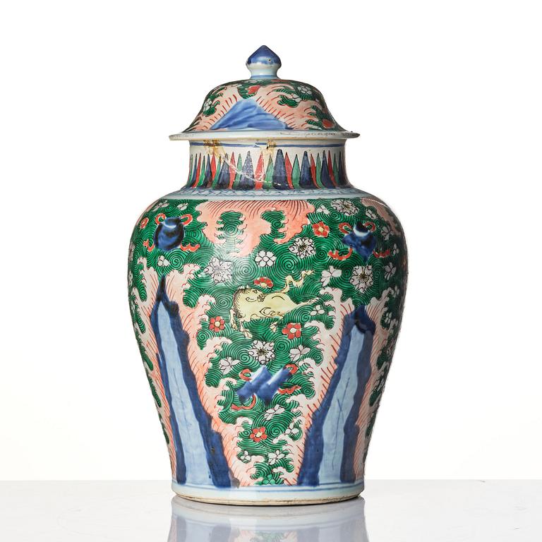 A Transitional wucai 'flying horse' baluster jar with cover, 17th century.