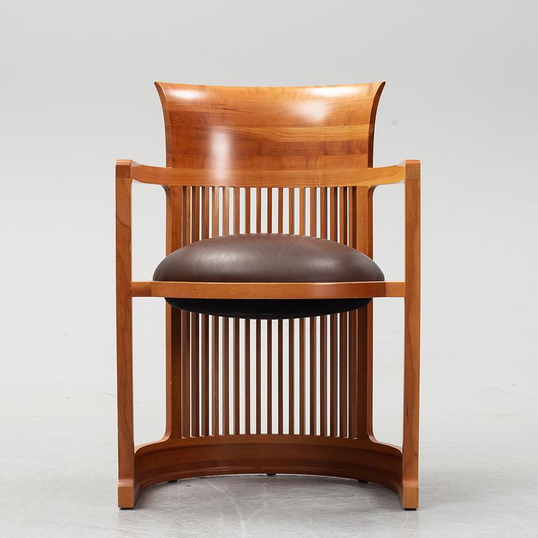 A model 606 'Barrel' chair by Frank Lloyd Wright for Cassina, designed 1937.