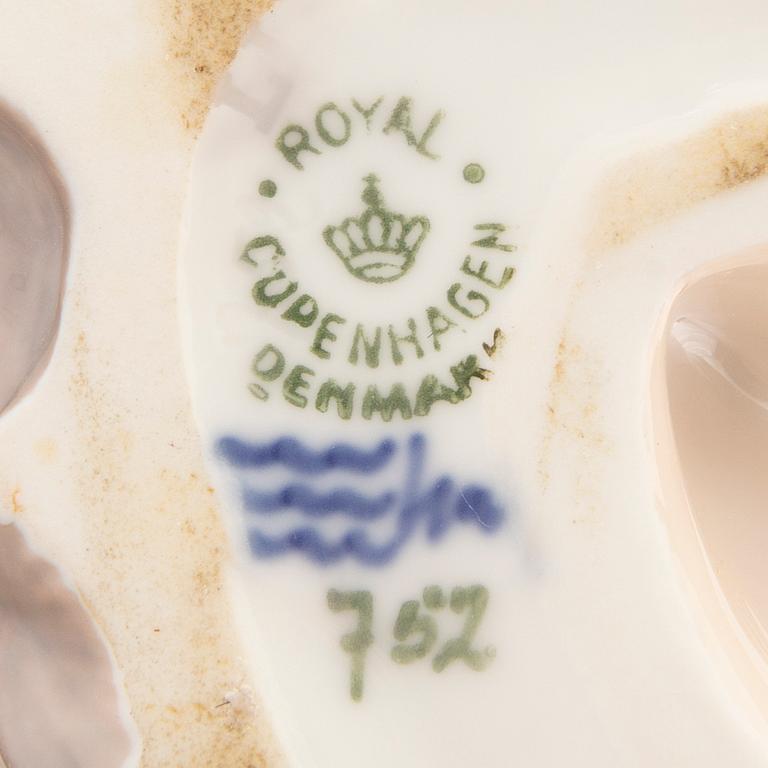 A Royal Copenhagen porcelain figurine.