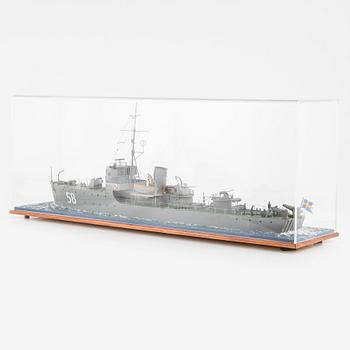 A wooden scalemodel of the Swedish minesweeper 'HMS Ulvön', built by Ingvar Lyckhammar.