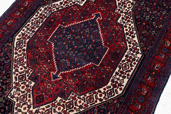 A Senneh rug, c. 160 x 117 cm.