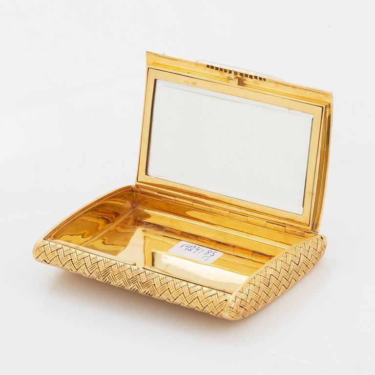 18K gold and diamond vanity case.