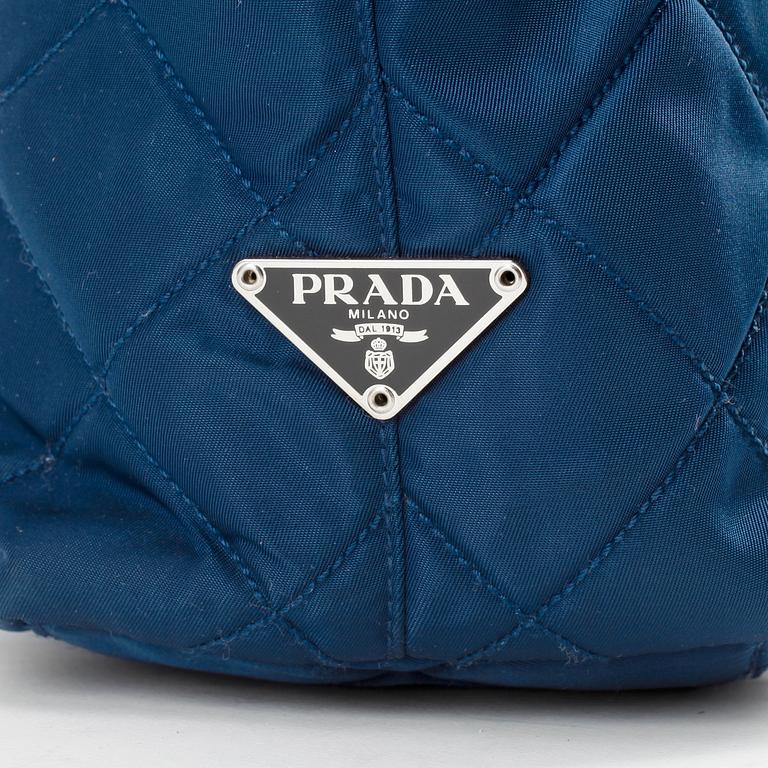 PRADA, a blue nylon and black leather shoulder bag and a wallet.