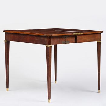 A Gustavian 'concertina action' mahogany games table by Georg Haupt (master in Stockholm 1770-84).
