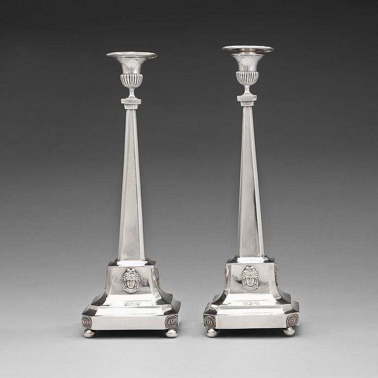 A pair of Swedish early 19th century silver canlesticks, marks of Pehr Zethelius, Stockholm 1809.